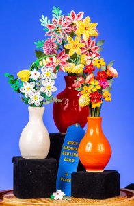 Trio of vases with flowers