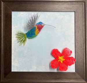 Hummingbird and Hibiscus flower