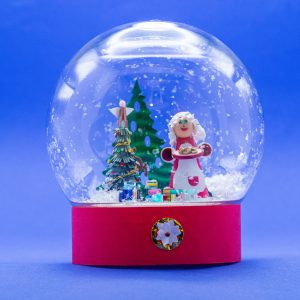 Snow-globe -Mrs. Santa with plate of cookies and a tree.