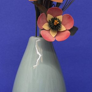 Light green ceramic vase with colorful quilled flowers