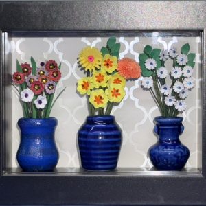 Adorable miniature floral shadow box with white, yellow and red flowers