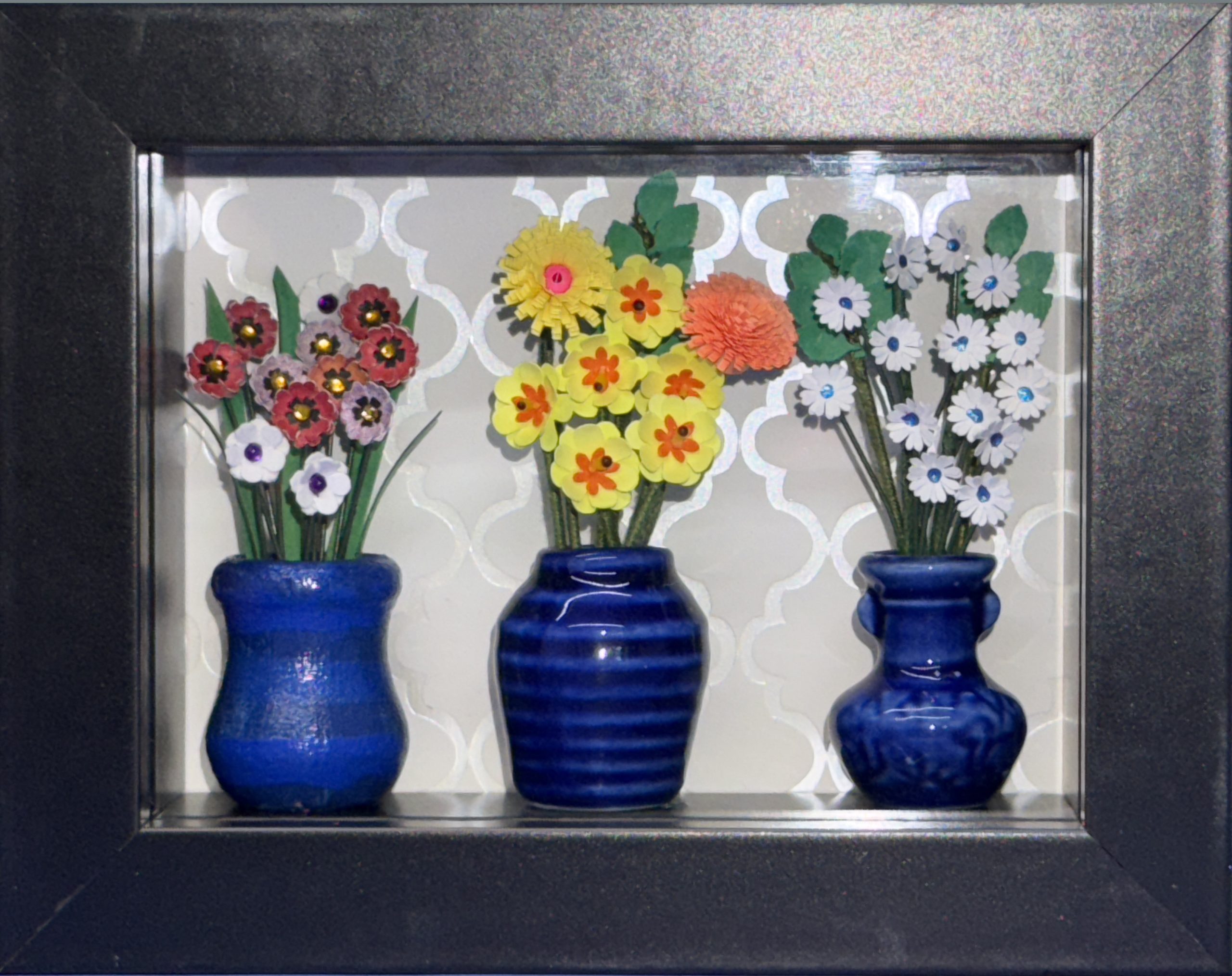 Adorable miniature floral shadow box with white, yellow and red flowers