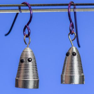 This small pair of silver ghosts are just hanging out waiting for Halloween and you. They are made with 1/8″ shiny silver paper