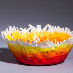 This unique paper bowl is sturdy enough to hold most trinkets and medium weight objects. It is 2.25" high by 5.5" in diameter. Use it for jewelry, Easter eggs, Christmas balls, candy, general decoration items.