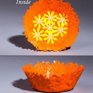 This unique paper bowl is sturdy enough to hold most trinkets and medium weight objects. It is 2" high by 5" in diameter. Use it for jewelry, Easter eggs, Christmas balls, candy, general decoration items.