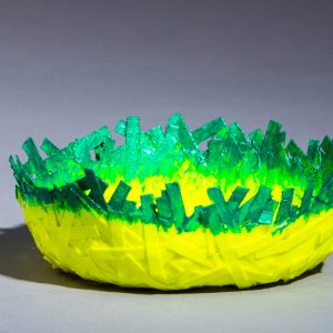 This unique paper bowl is sturdy enough to hold most trinkets and medium weight objects. It is 1.25" high by 3.5" in diameter. Use it for jewelry, Easter eggs, Christmas balls, candy, general decoration items.