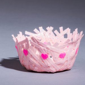 This unique paper bowl is sturdy enough to hold most trinkets and medium weight objects. It is 1.75" high by 2.75" in diameter. Use it for jewelry, candy, small decoration items.