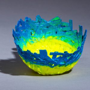 This unique paper bowl is sturdy enough to hold most trinkets and medium weight objects. It is 1.75" high by 2.75" in diameter. Use it for jewelry, candy, small decoration items.