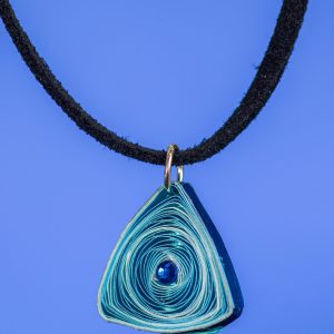 This triangle pendant is made with 1/8" blue and white paper using the vortex method and wrapped in sapphire blue metallic paper. There is a small sapphire blue rhinestone in the center